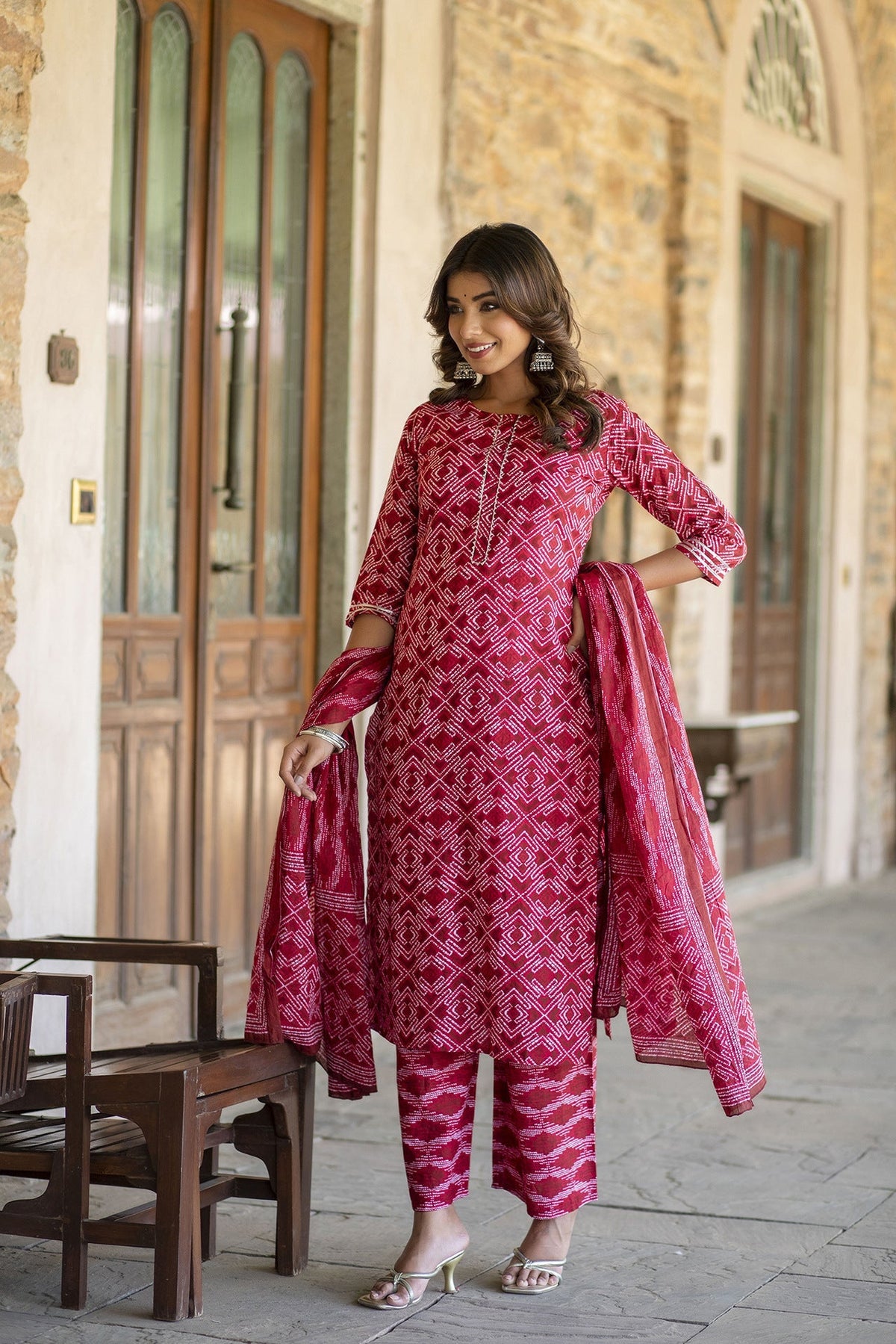 Women Red Bandhani Printed Straight Kurta With Palzzo And Dupatta