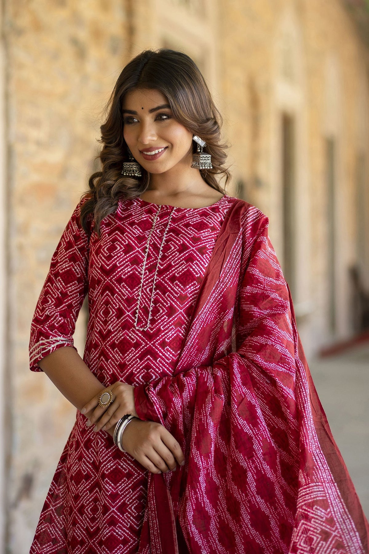 Women Red Bandhani Printed Straight Kurta With Palzzo And Dupatta