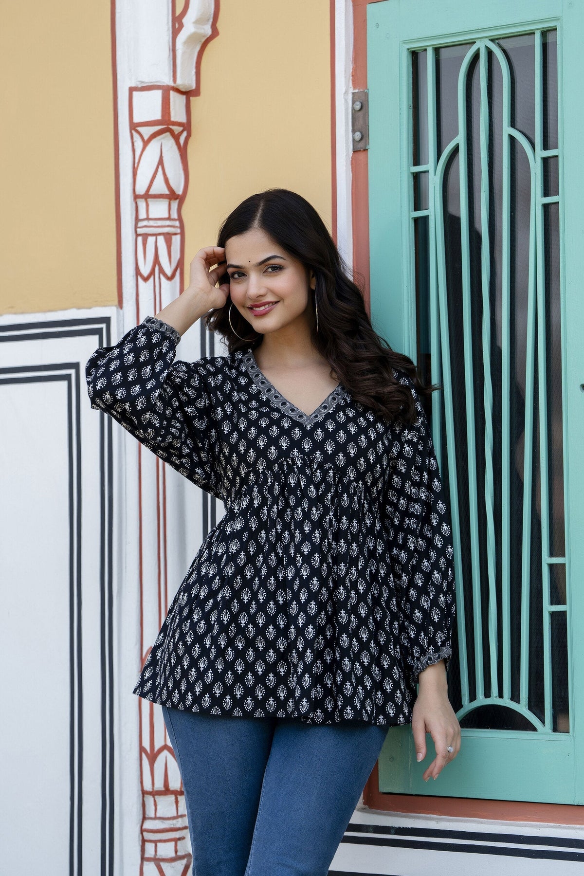 Women Black Printed V-Neck Peplum Top