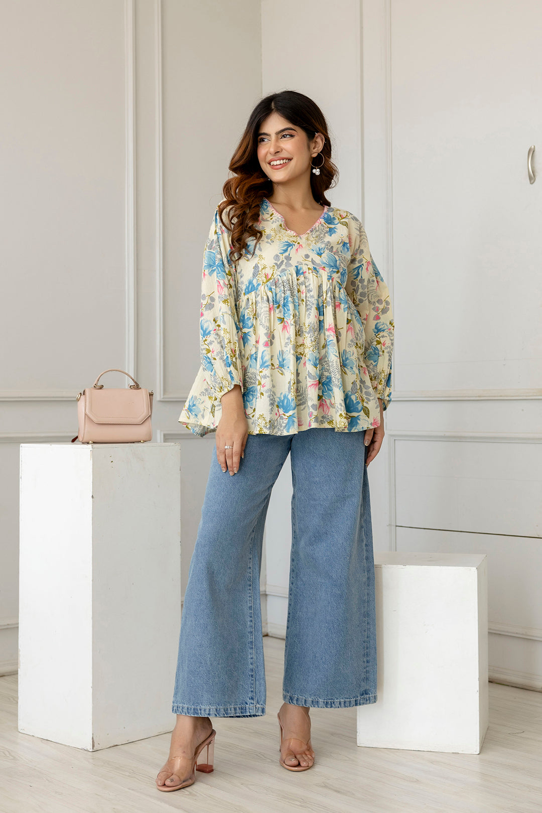 Women Off-White Printed V-Neck Peplum Top