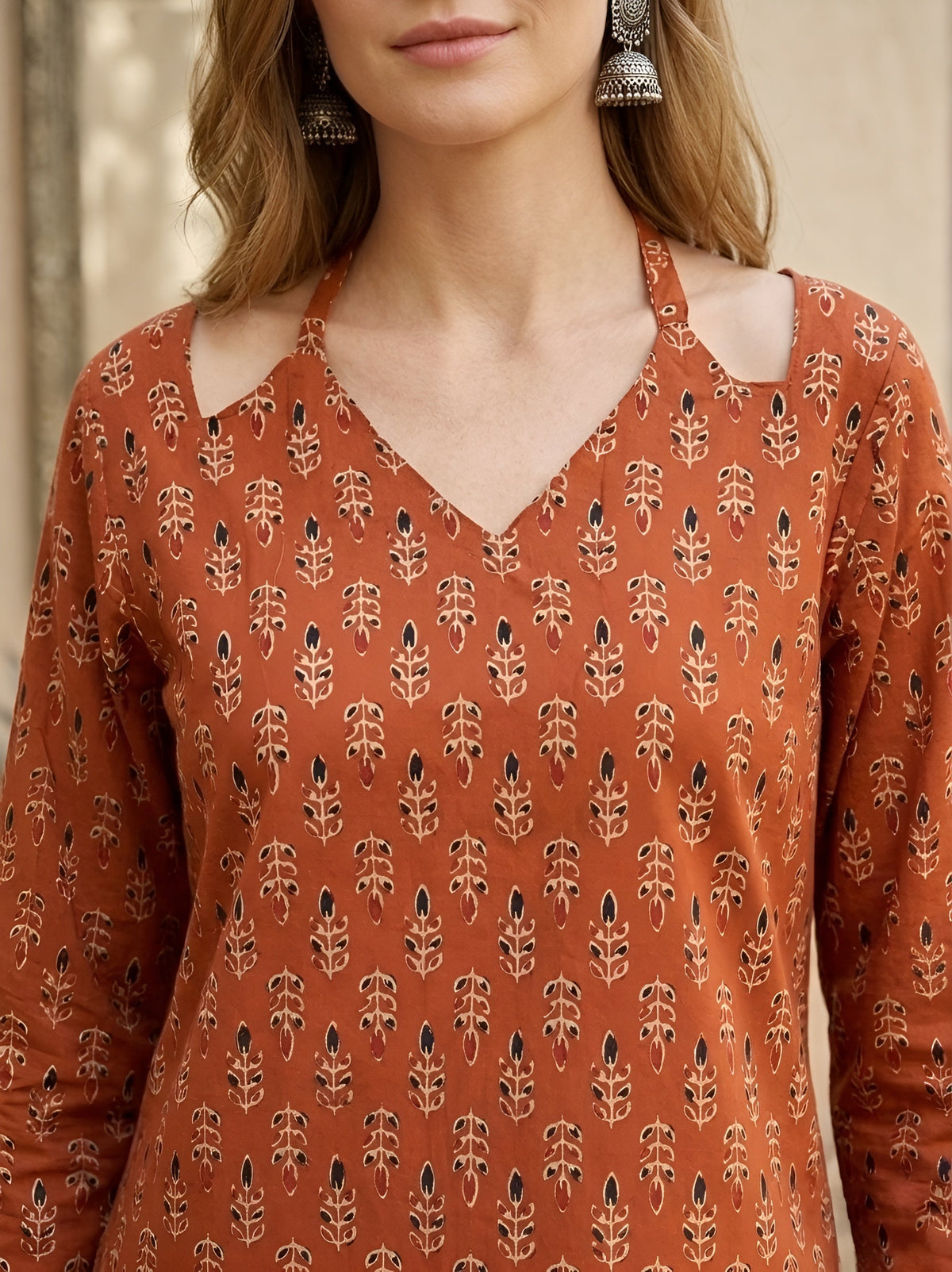 Women Rust Printed Straight Tunic With Tie-up Neck