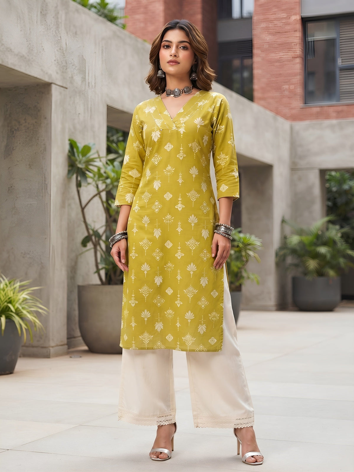 Yellow Printed Straight Kurta with Three Quarter Sleeves